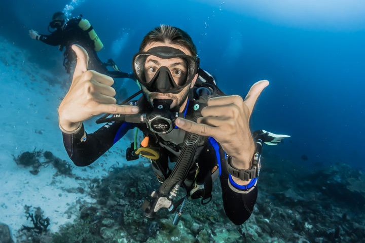 Scuba diver giving hand signal